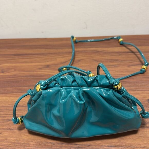 NWOT Cloud Pleated Mini Cross Body Bag in Teal Blue Patent Leather/Gold Bead. - Picture 2 of 5